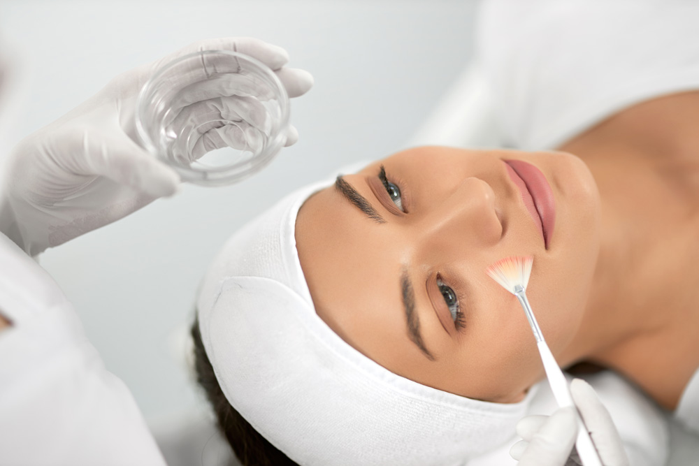 Chemical Peel Facial Treatment - illustration of a woman getting treatment