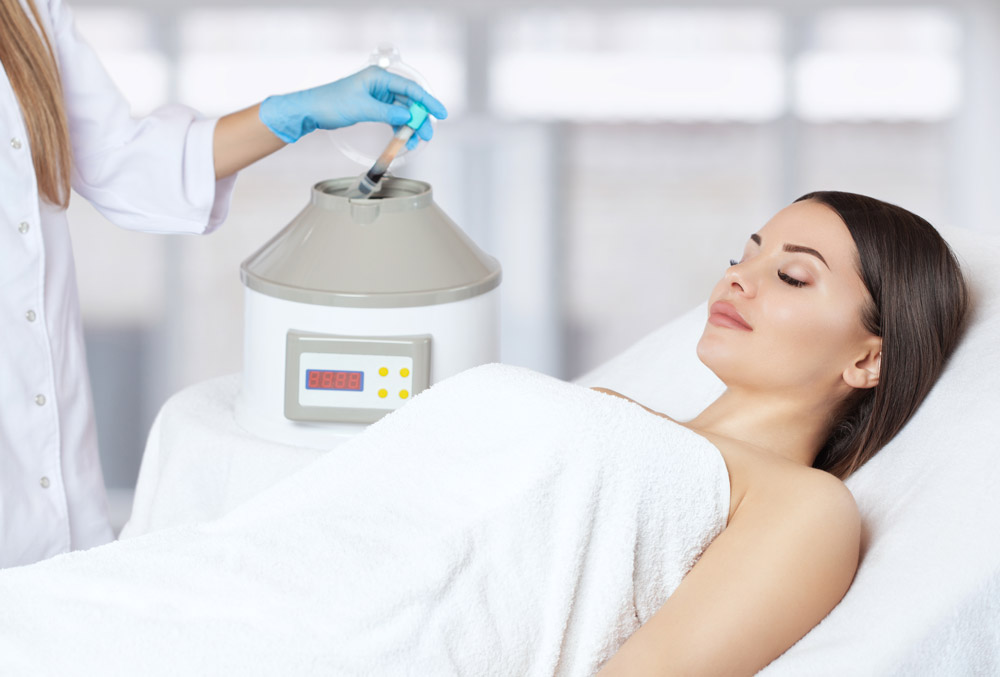 PRF or PRP for Wrinkle Treatment? First off, what are these two forms of skin rejuvenation? - An image of a woman lying down on a bed, getting ready for the treatment.