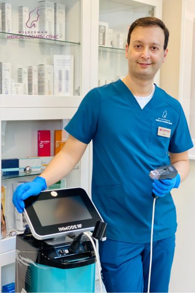 Photos of Dr. Arash in our Cosmetic Clinic preparing to perform the Morpheus8 procedure.